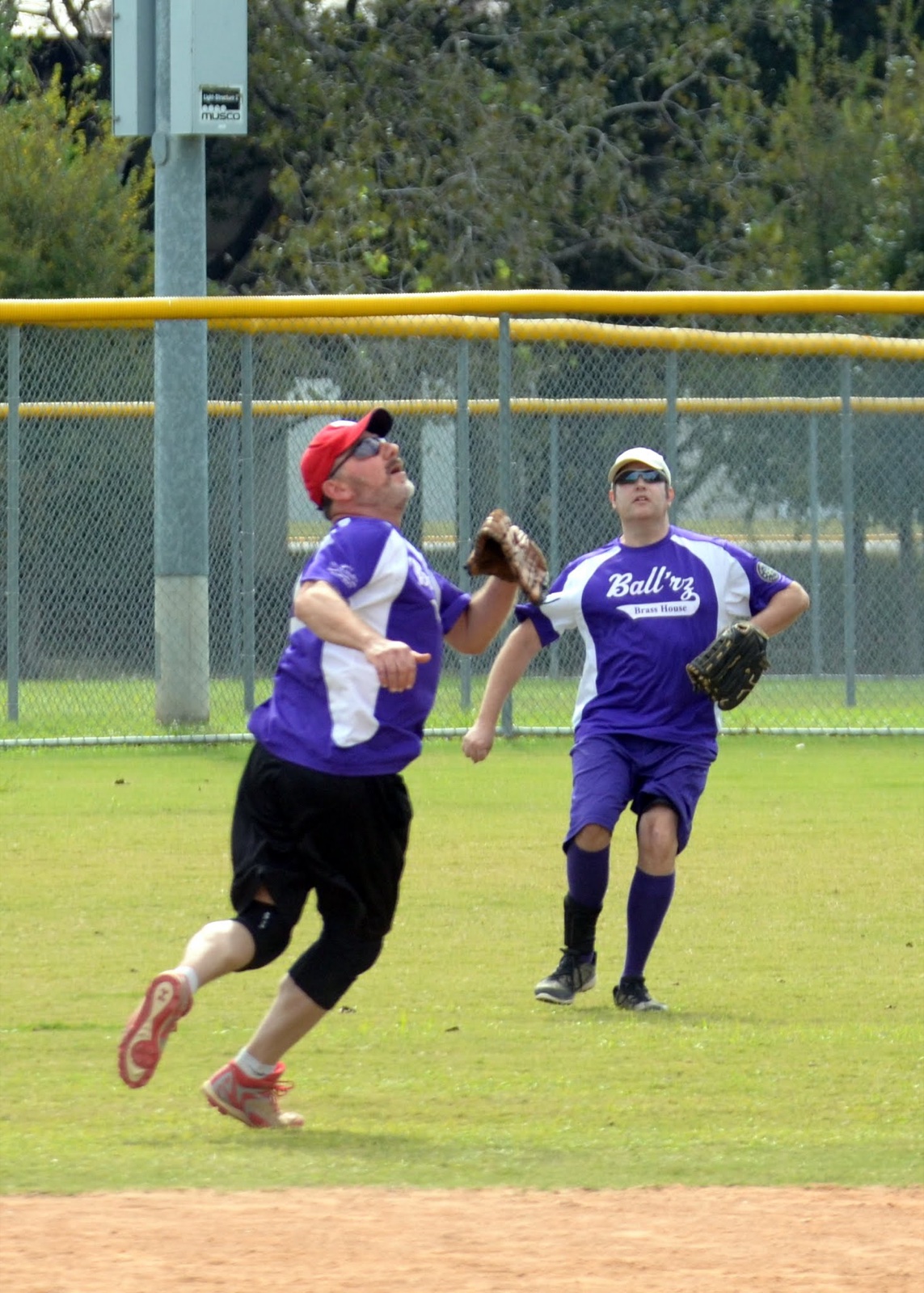 John G and Tim on the softball field, D Team Fall 2016